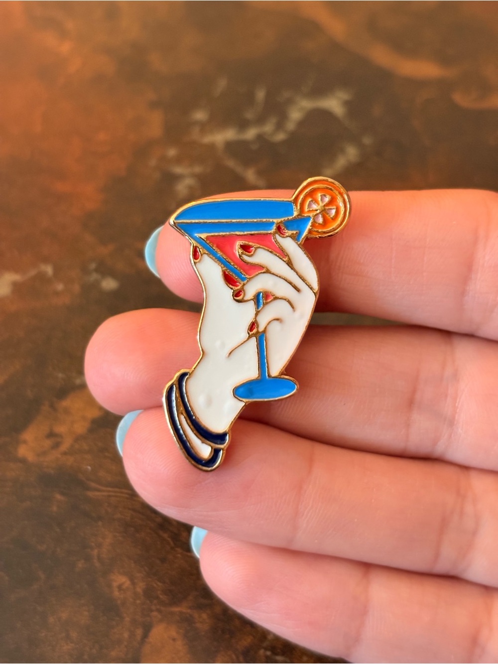 Hand Holding Martini Cocktail Enamel Pin - Blue & White Pin